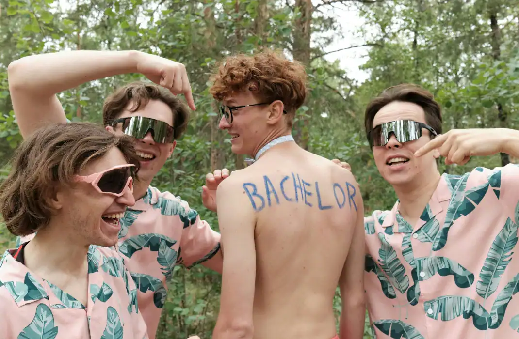 friends at a beach bachelor party