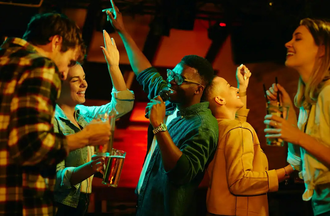 friends having a ball at karaoke night