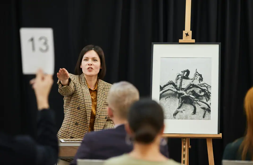 woman hosting auction