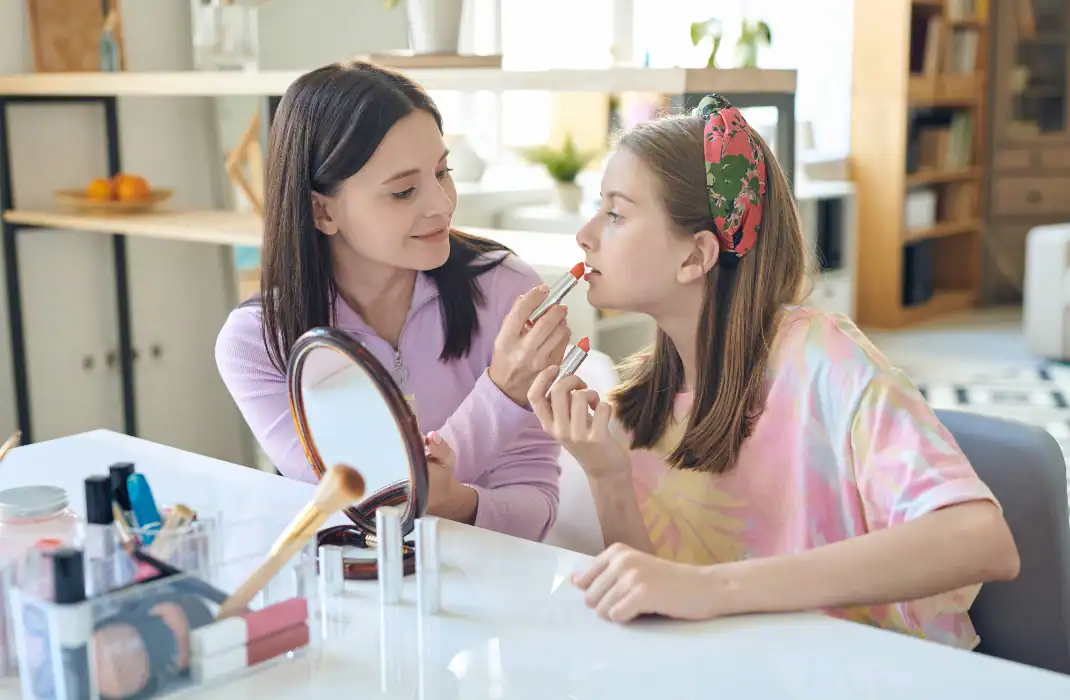girls playing with makeup
