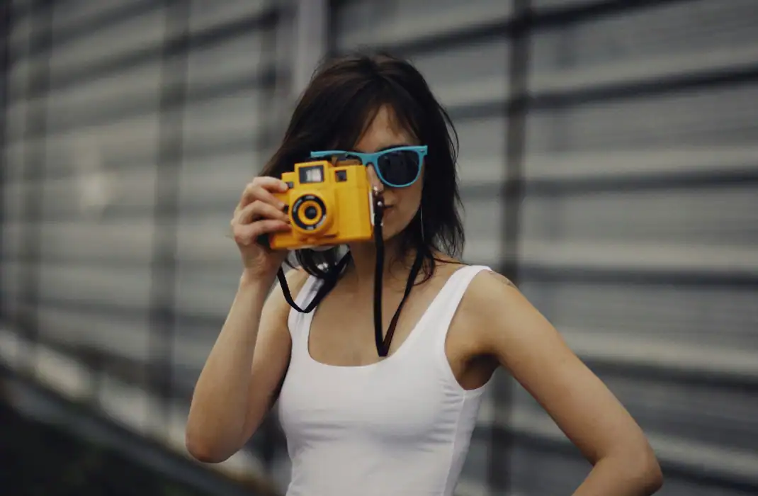 girl with an instant camera