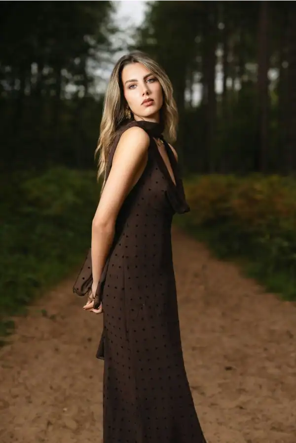 Woman wearing an elegant black dress for an engagement party