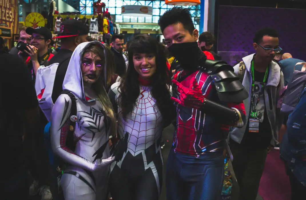 friends dressed as superheroes