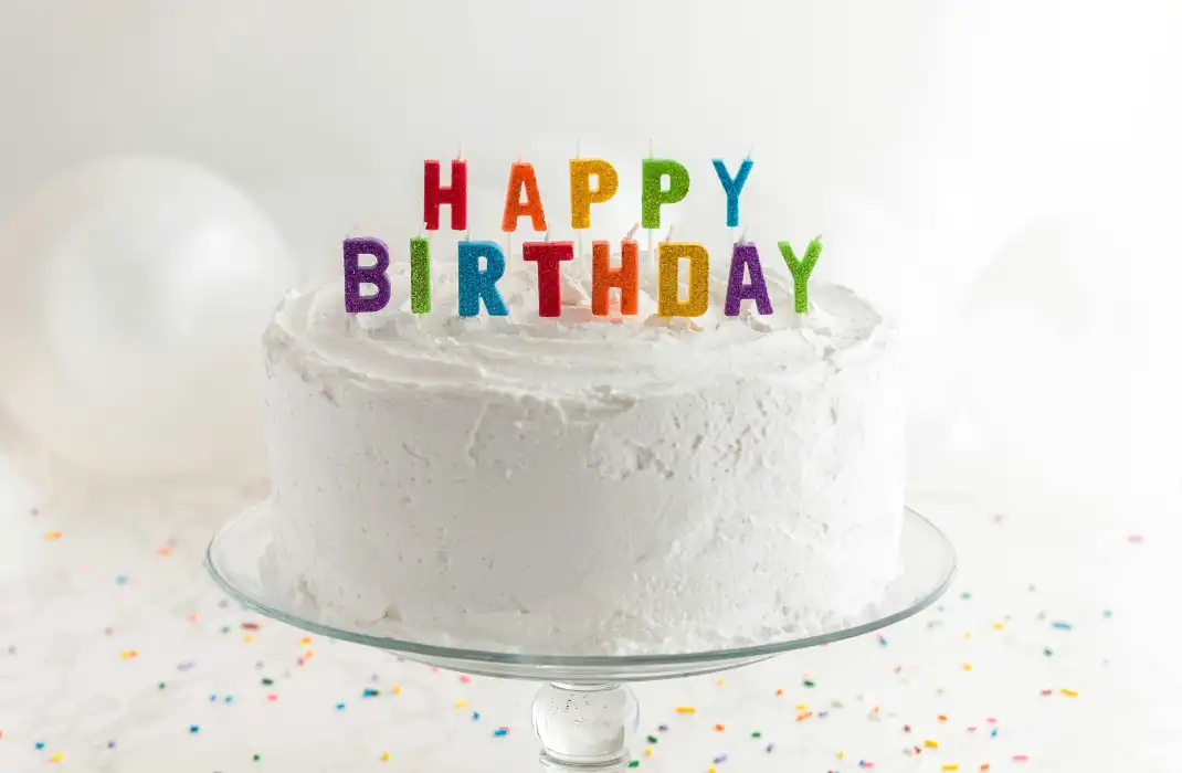 vanilla birthday cake with candles