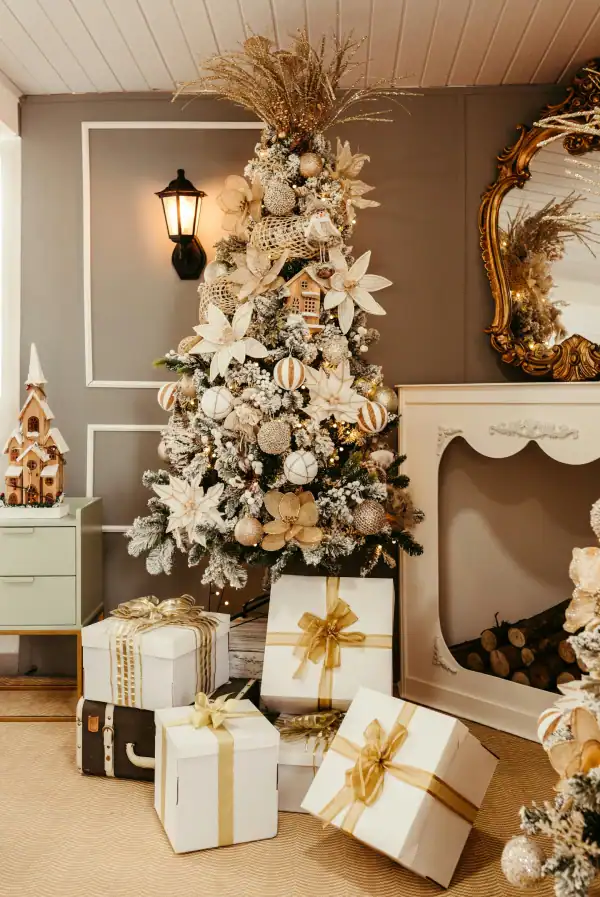beautiful christmas tree surrounded by gifts