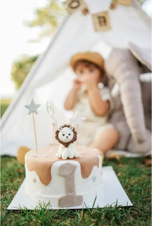 birthday cake with lion and number one at the top
