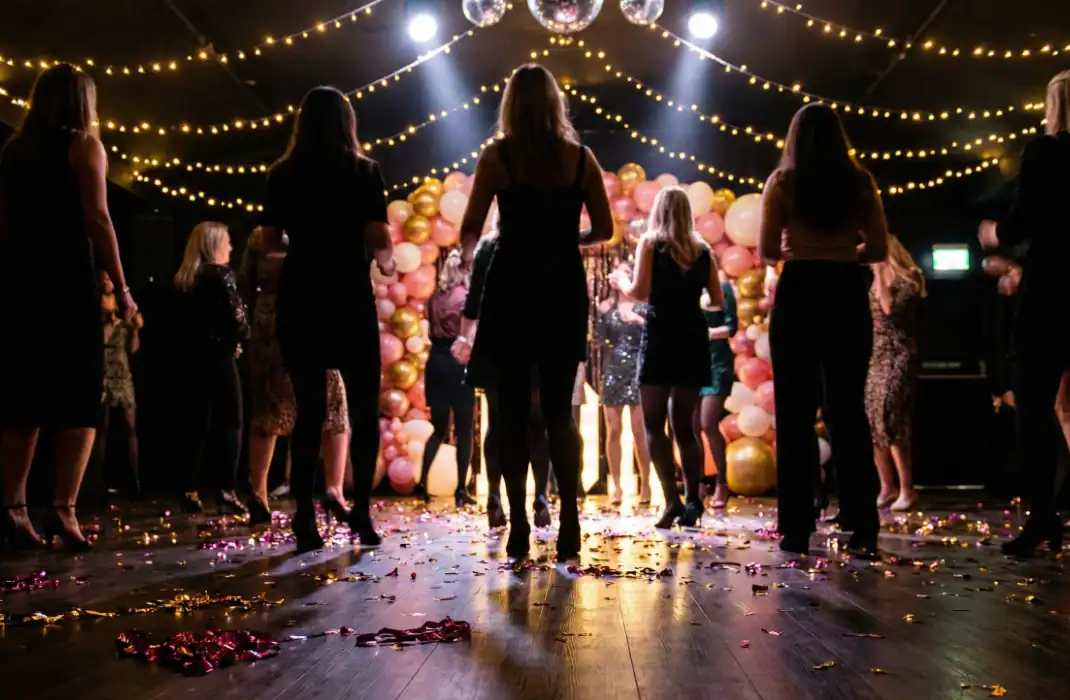 friends on a dance floor at party