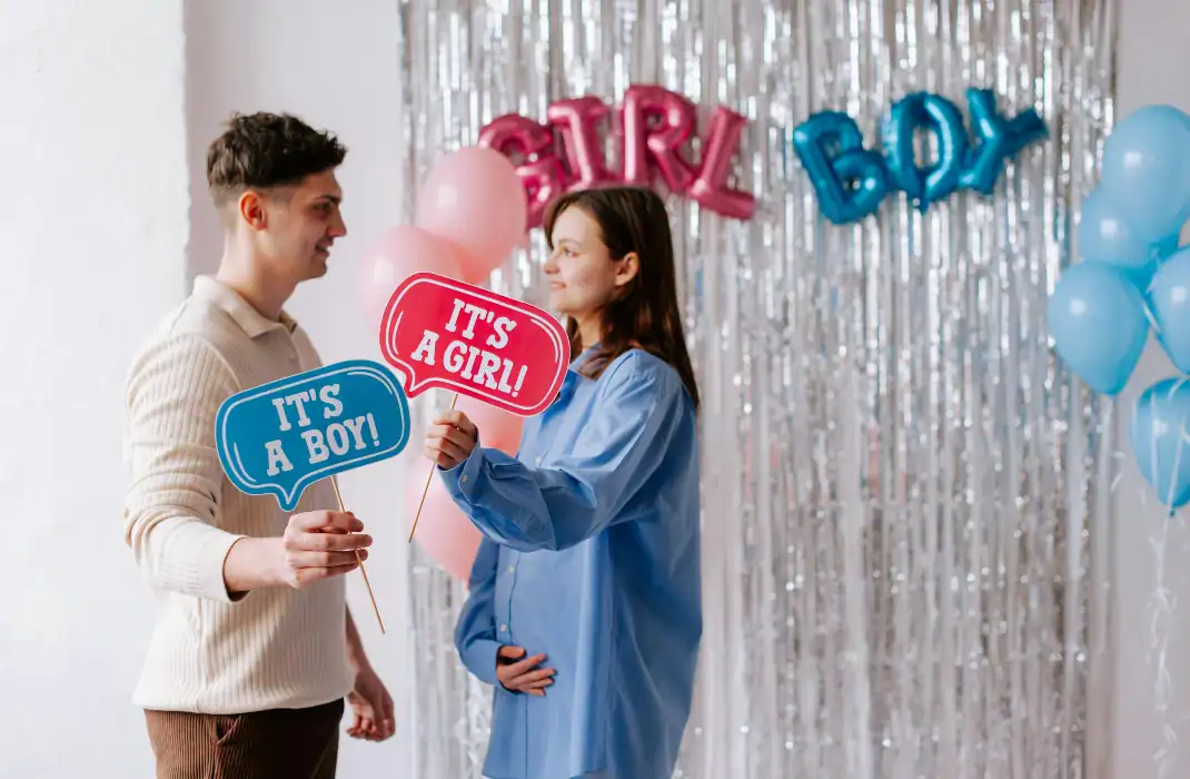 woman and man standing with signs in their hands